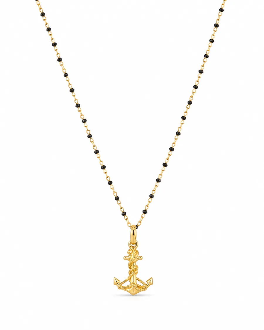 Collana con ciondolo ancora e pietre nere in oro giallo 18 kt